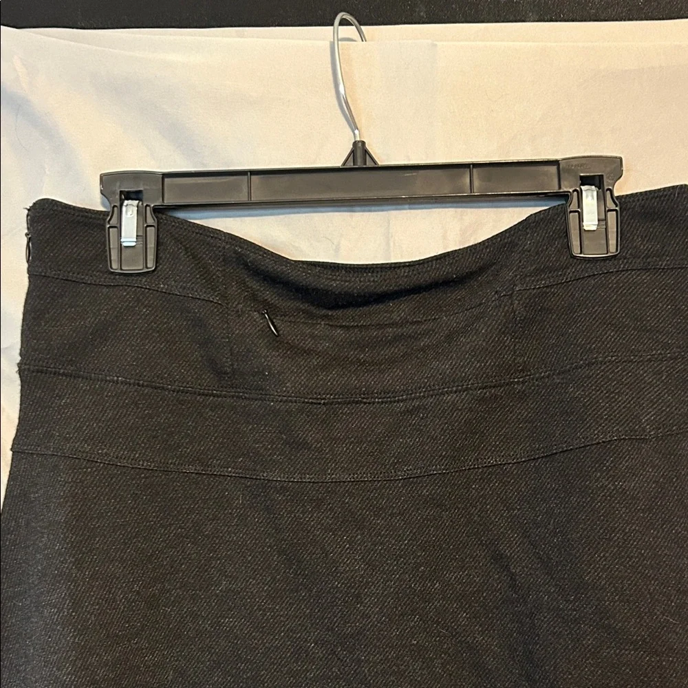 Athleta Black Mini Skirt (No Shorts) Zipper. Size 8 Fixed slight hole (Pictured) - Picture 9 of 11